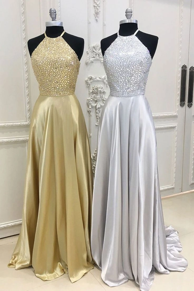 Two elegant formal dresses displayed at Precision Alterations Tucson, showcasing expert gown tailoring and fit adjustments.